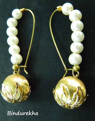 WhitePearlsBrassBall 1