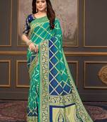 Turquoise woven banarasi silk saree with blouse