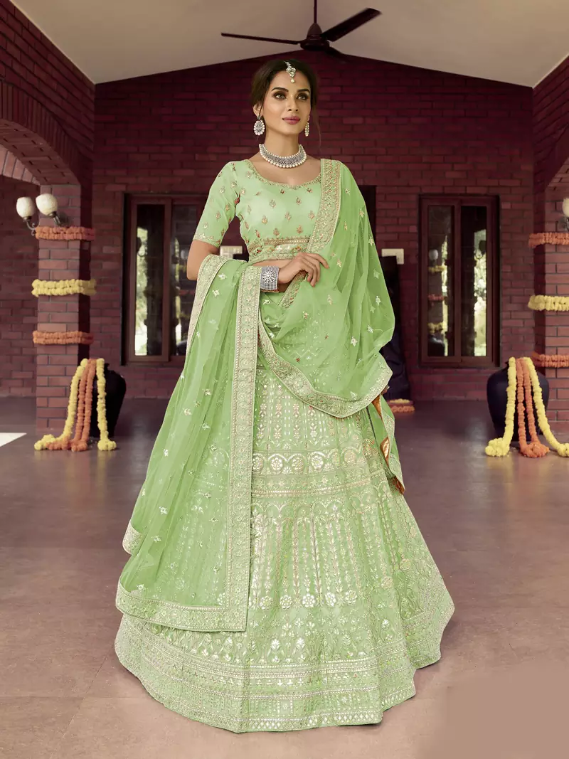 Dazzling Pale Leaf Green zarkan, gota, zari, and resham embroidered organza semi stitched Bridal lehenga