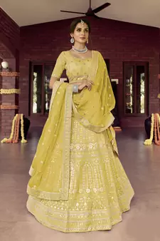 Seductive Tacha Yellow zarkan, gota, zari, and resham embroidered organza semi stitched Festive lehenga