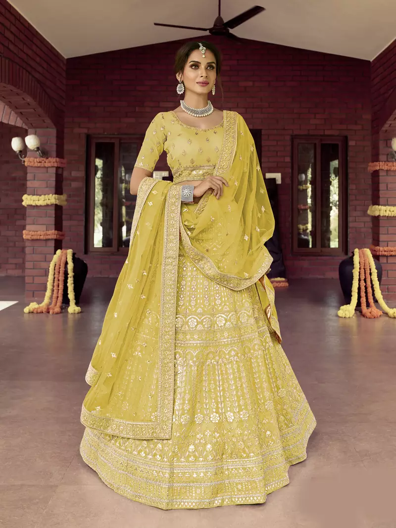 Seductive Tacha Yellow zarkan, gota, zari, and resham embroidered organza semi stitched Festive lehenga