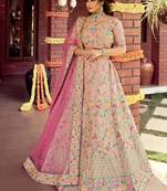Ravishing Rose Baby-pink sequins, zarkan, and resham embroidered raw Silk Semi Stitched Bridal Lehenga