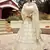 Entrancing Akaroa Off-white gota, zarkan, and resham embroidered crepe semi stitched Bridal lehenga