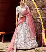 enticing Amour White swarovski, zarkan, zari, and resham embroidered satin Semi Stitched Dulhan Lehenga