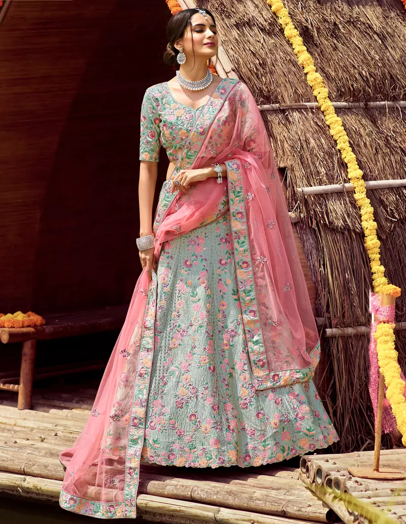 inviting Cascade Green swarovski, zarkan, zari, and resham embroidered satin semi stitched Festive lehenga