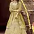 fascinating Yellow zarkan, zari, and dori embroidered velvet semi stitched Bridal lehenga