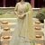 pleasing Light-yellow zarkan, gota, and dori embroidered organza semi stitched Festive lehenga