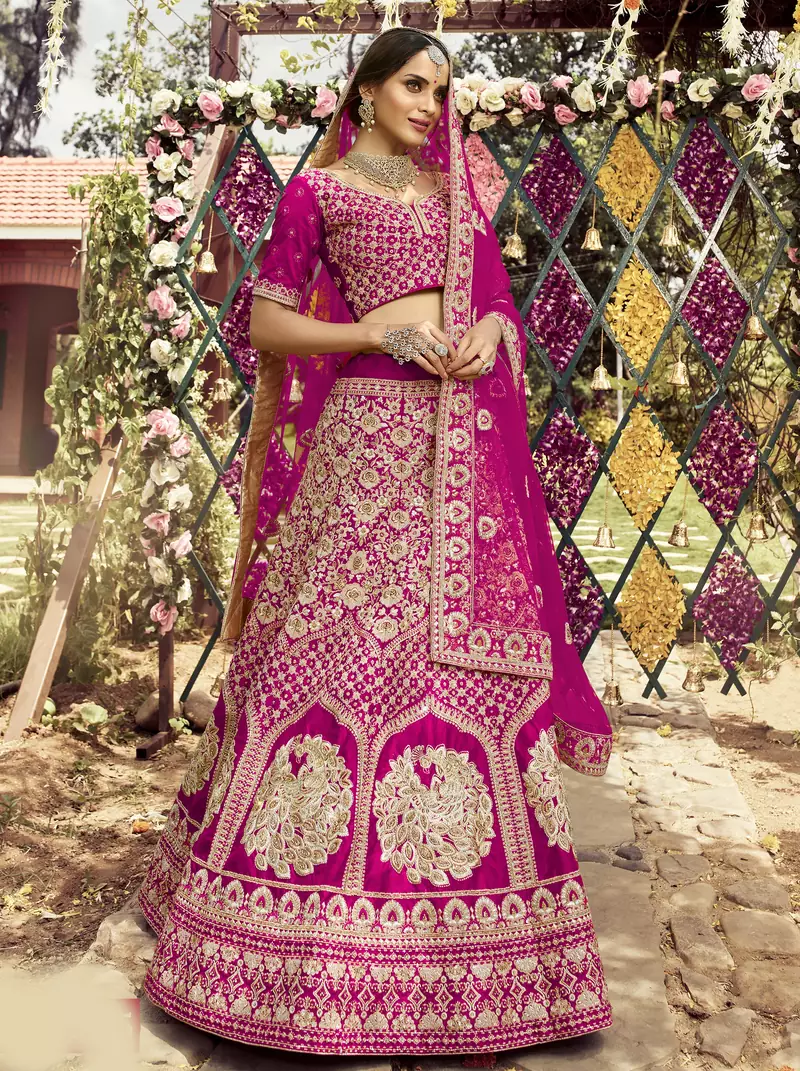 pleasant Rani-pink zarkan, dori, and zari embroidered raw silk semi stitched Bridal lehenga