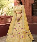 Yellow zarkan, dori, velvet pasting, and thread embroidered organza Semi Stitched Lehenga