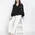 Gonzo solid black women dobby top