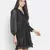 Astute solid black celeb- style women shimmer tie knot dress