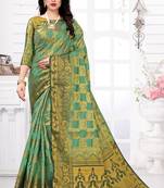 Green woven banarasi silk saree with blouse