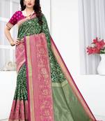 Green woven banarasi silk saree with blouse