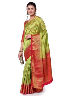 Light green woven banarasi silk saree with blouse