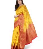Yellow woven banarasi silk saree with blouse