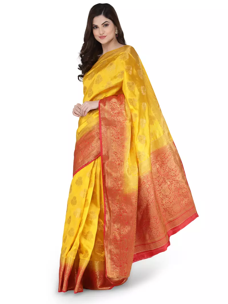 Yellow woven banarasi silk saree with blouse