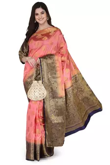 Pink woven banarasi silk saree with blouse