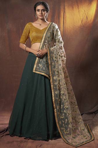 Mesmerizing Green golden zari, sequins and thread embroidered georgette Lehenga choli