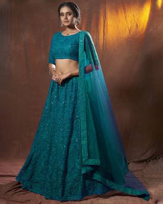Bewitching Dark green thread embroidered net fabric lehenga choli 3