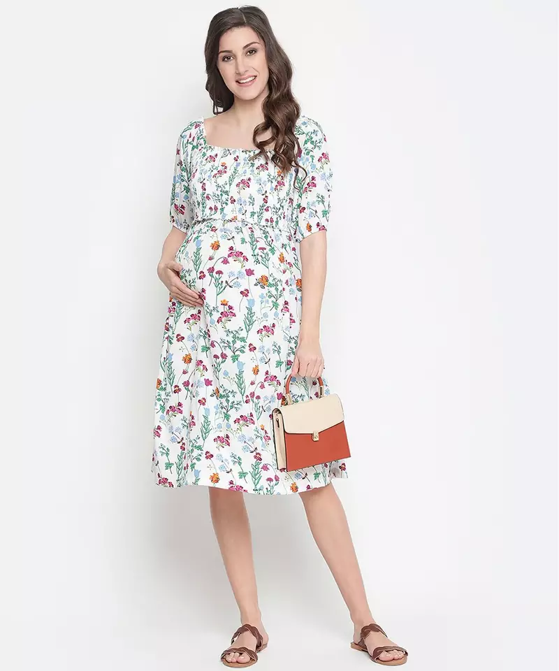 Polished white floral print ruffled maternity smokced dress