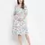 Polished white floral print ruffled maternity smokced dress