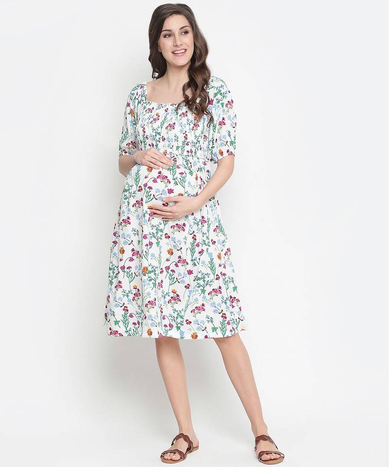 Polished white floral print ruffled maternity smokced dress