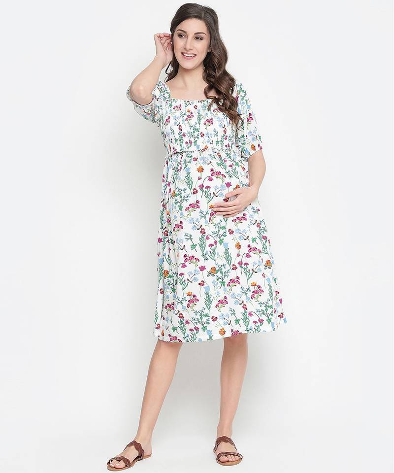 Polished white floral print ruffled maternity smokced dress