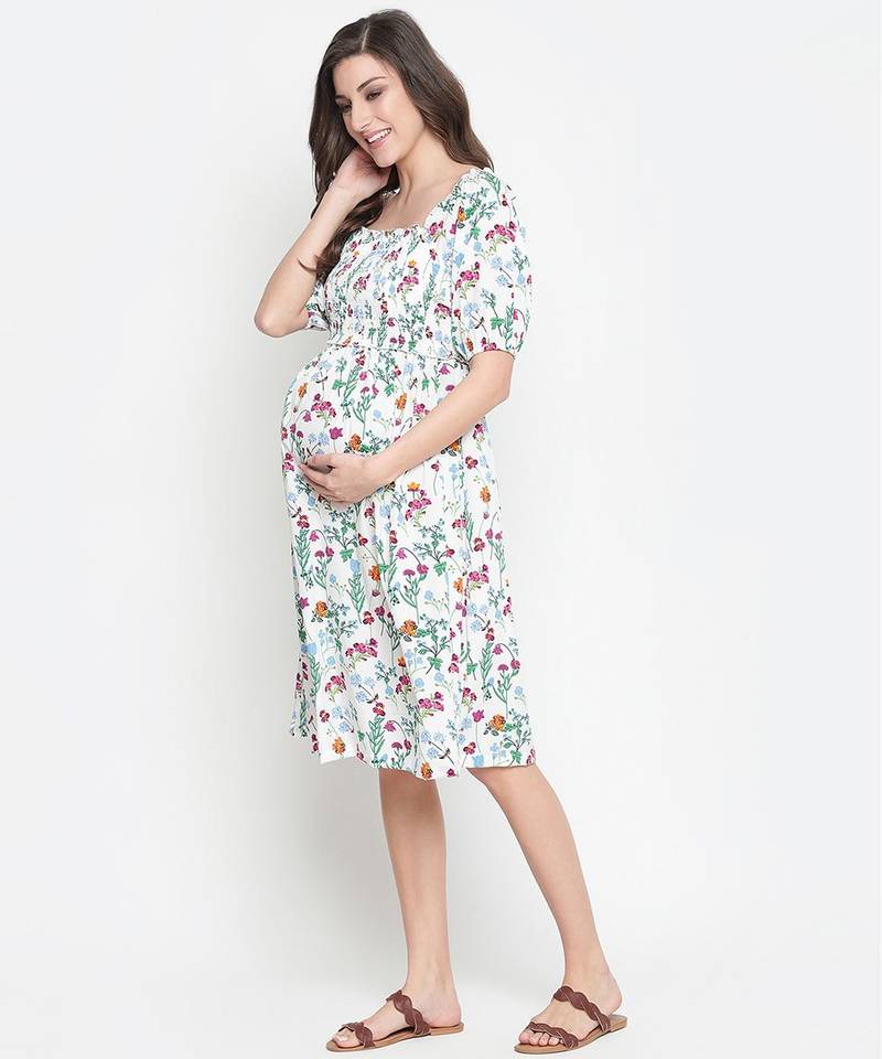 Polished white floral print ruffled maternity smokced dress
