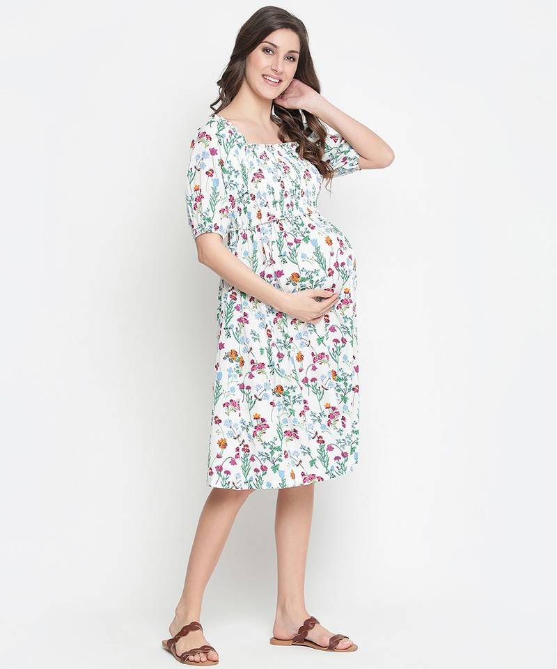 Polished white floral print ruffled maternity smokced dress