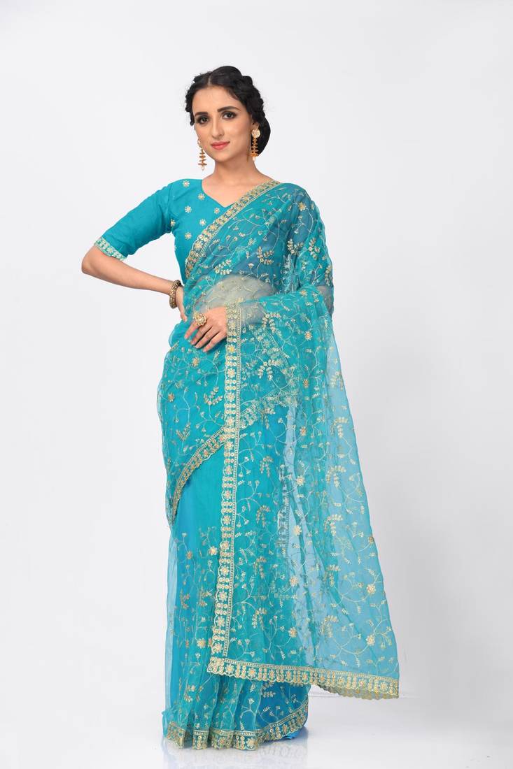 Aqua blue woven net saree with blouse