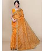 yellow soft organza saree with blouse piece