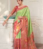 Light green woven kanchipuram silk saree with blouse