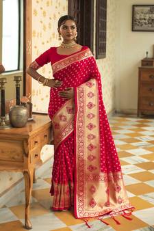 Rani pink woven silk blend saree with blouse