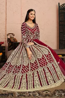 Magenta embroidered net salwar kameez