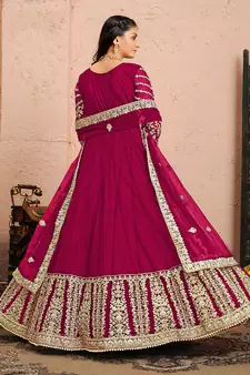 Magenta embroidered net salwar kameez