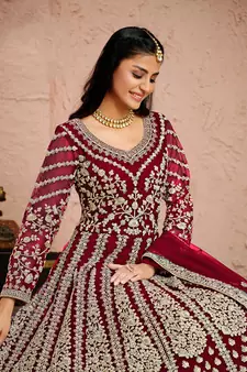 Magenta embroidered net salwar kameez