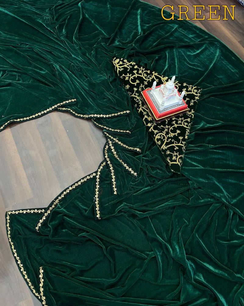 green emboroideri velvet saree