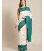 Single Ikkat on Cotton  striking color combination in whte and black hues of green