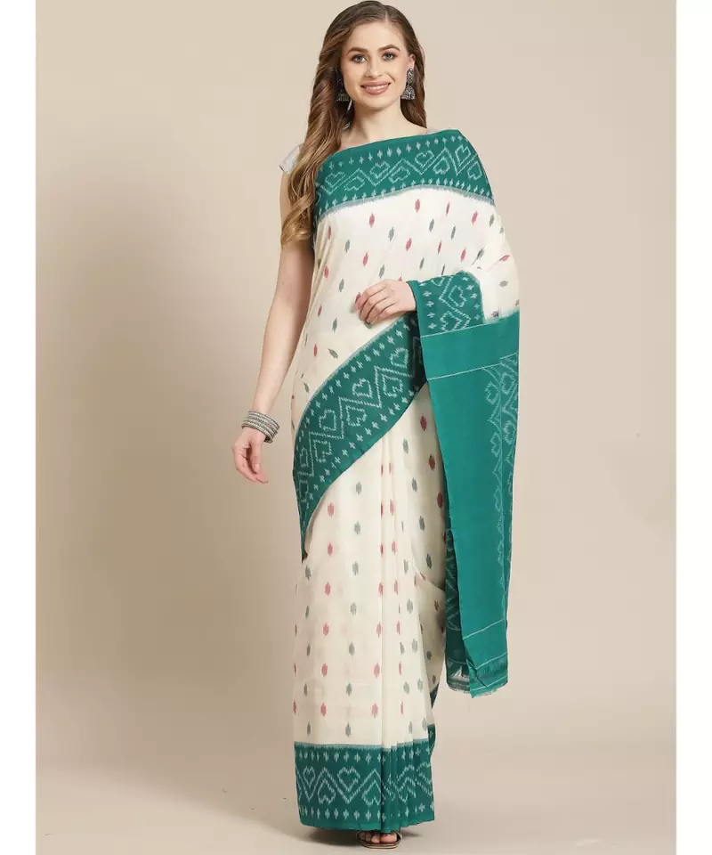 Single Ikkat on Cotton  striking color combination in whte and black hues of green