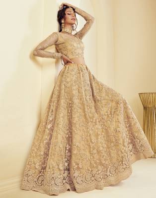 Golden embroidered net semi stitched lehenga 2
