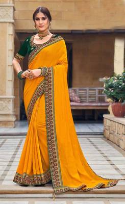 Woven Border Vichitra Silk Saree in Beautiful Yellow Color Paired with Embroidered Blouse 1