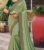 Woven Border Vichitra Silk Saree in Beautiful Light Pista Green Color Paired with Embroidered Blouse